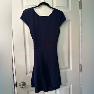 Navy mid length dress with back cut out